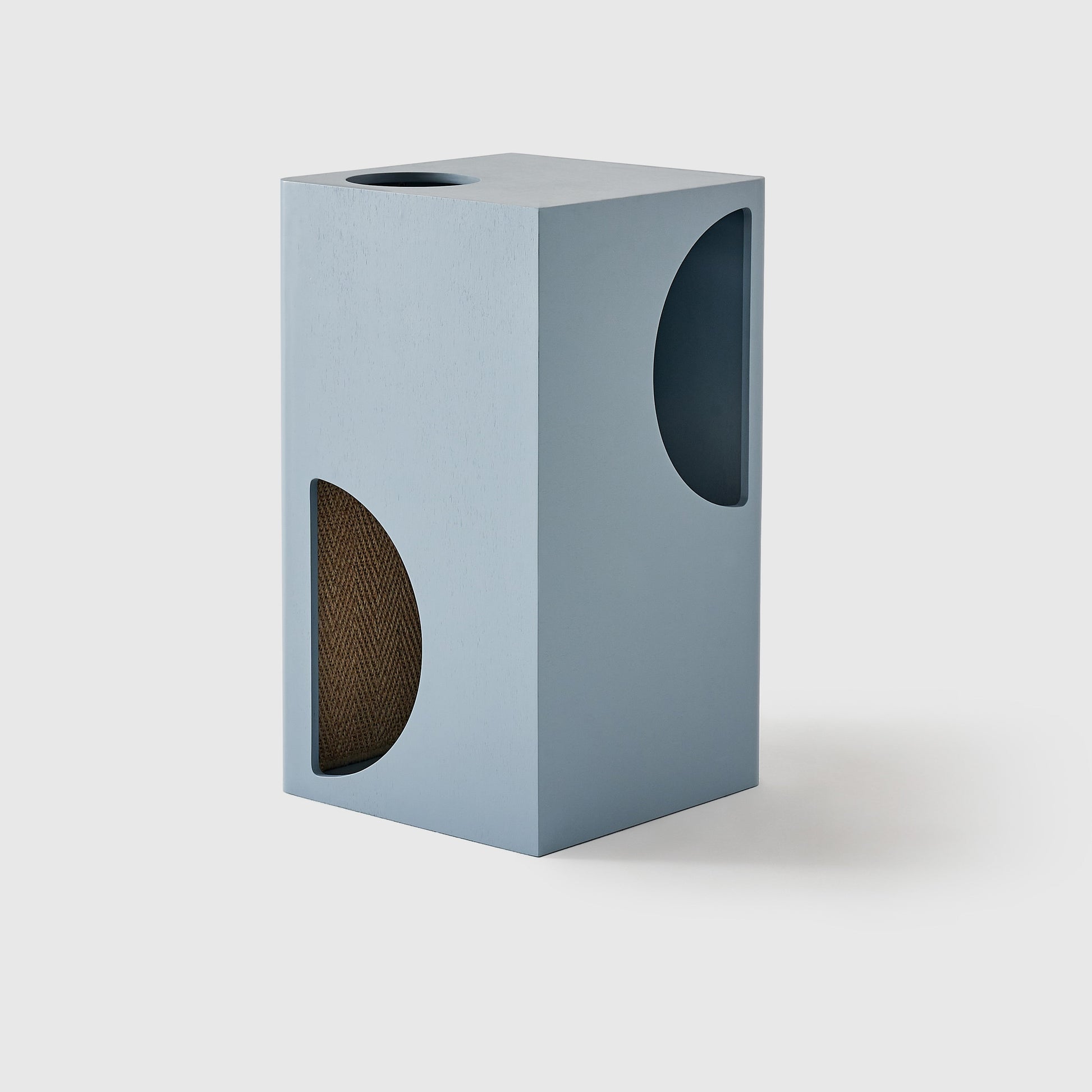 Cylindrical concrete planter with circular cutouts on a white background, featuring the brand 'jian ze'.