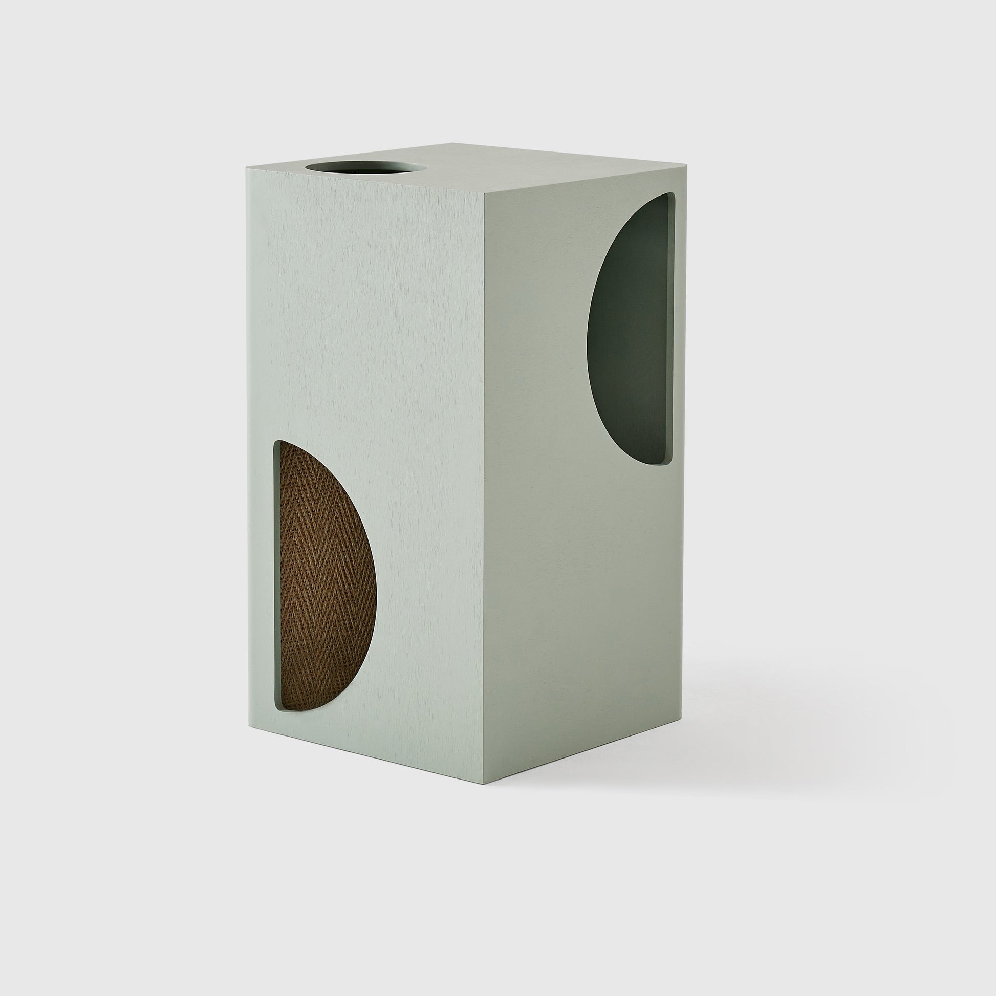 Cylindrical cat scratcher with a solid base and circular perforations on a white background, featuring the brand 'jian ze'.