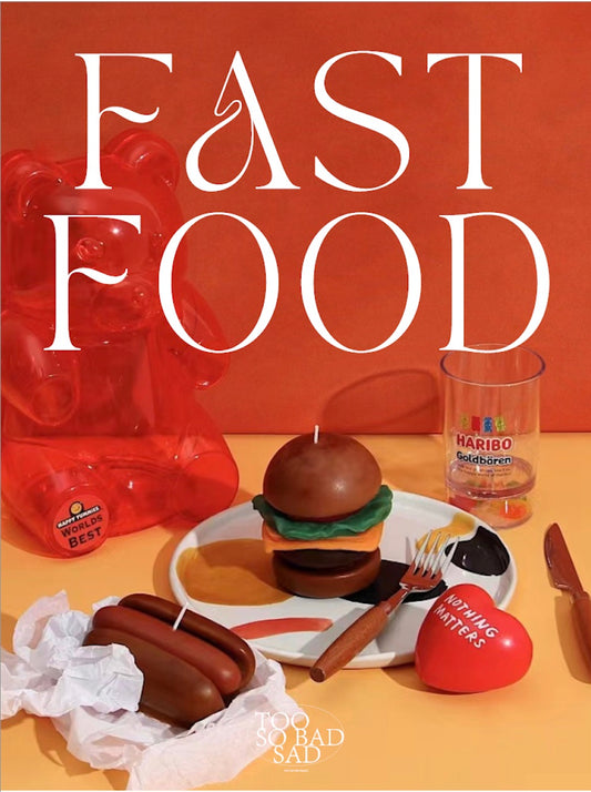 Book cover of 'Fast Food' with chocolate food items and Haribo candy on a red background
