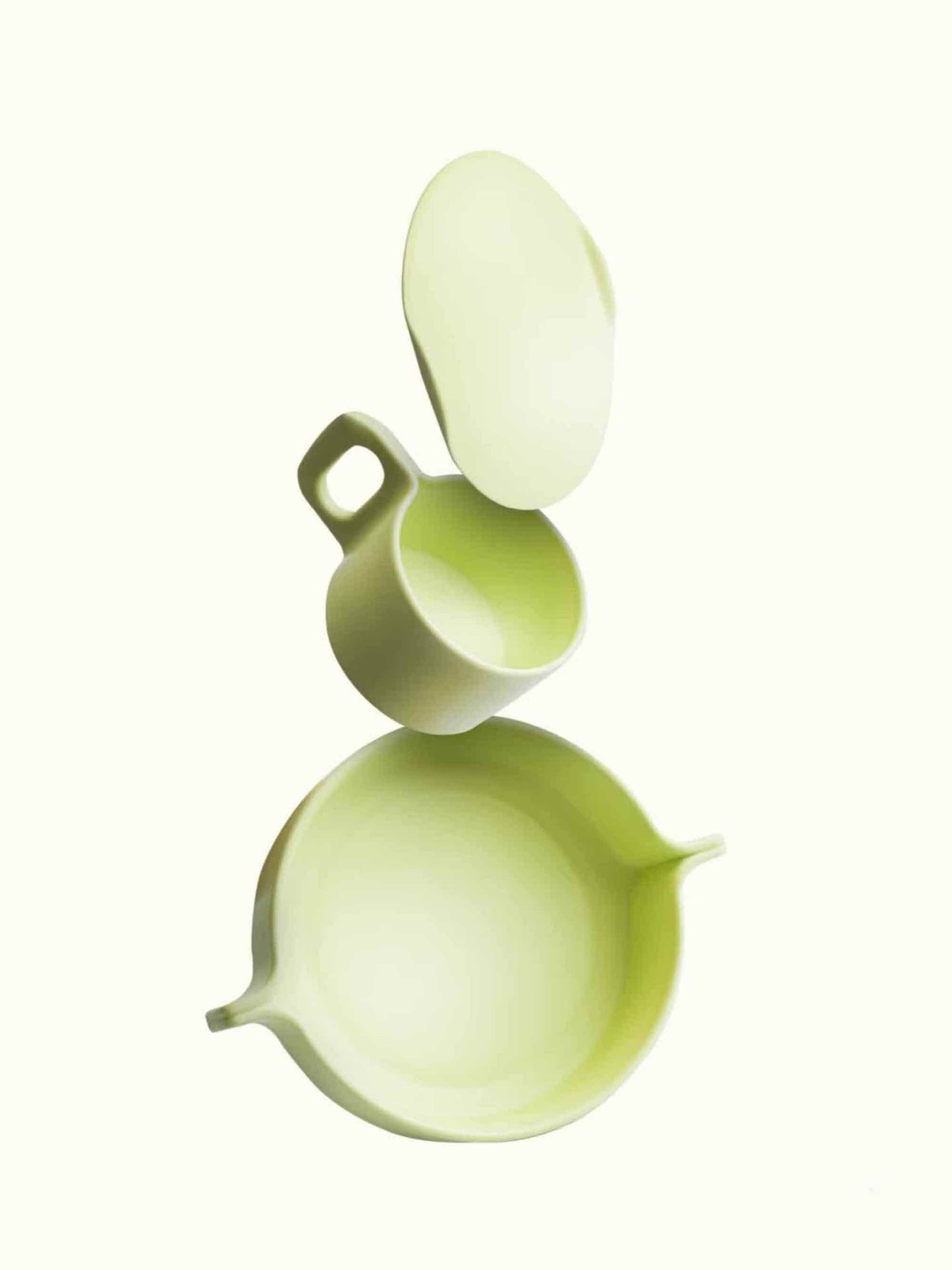 Set of green ceramic bowls on a white background