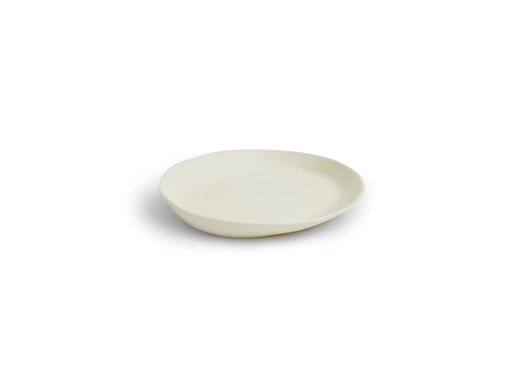 White ceramic plate on a white background